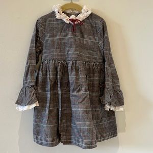 Like new this sweet dress has an old England mood